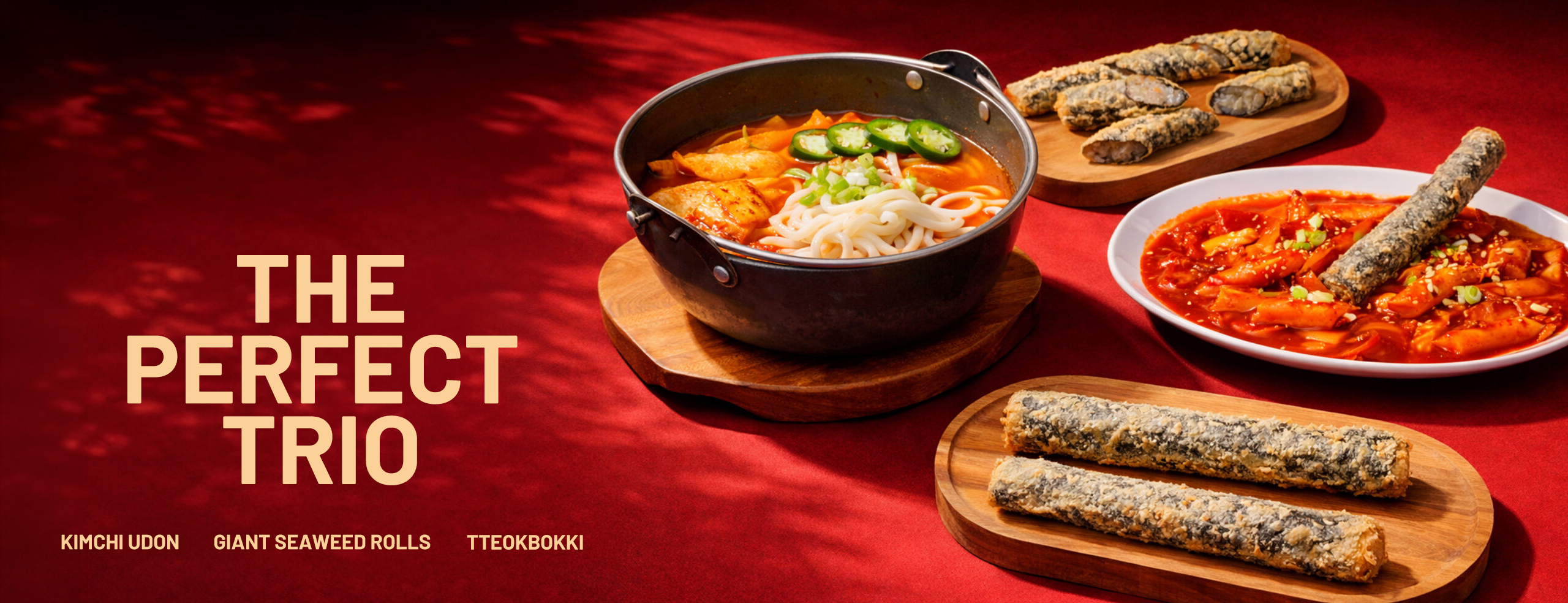 the perfect trio, kimchi udon, giant seaweed rolls, and tteokbokki